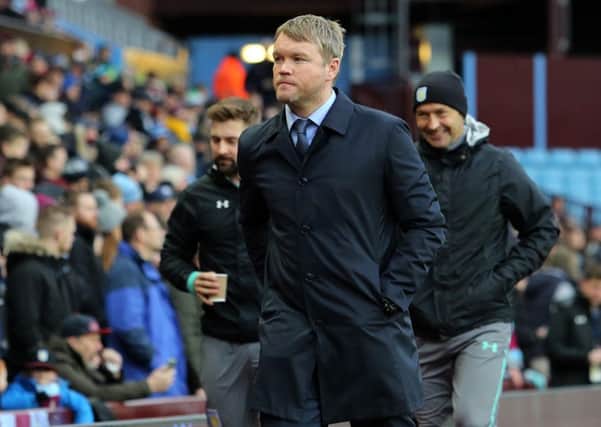 Grant McCann has completed 100 matches as Posh manager.