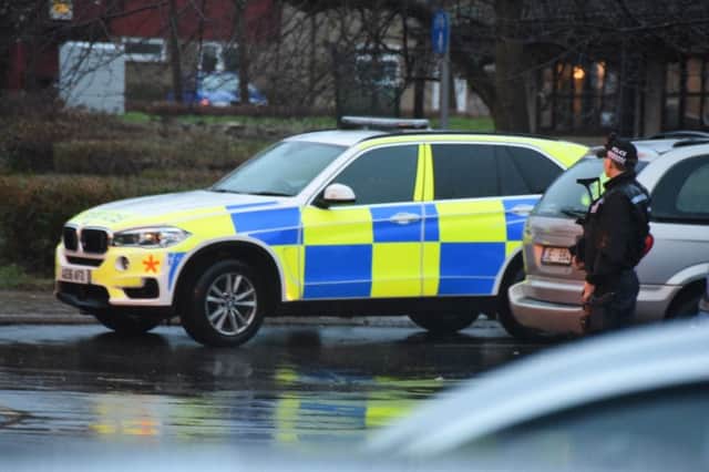 Armed police responding to the incident at the Herlington Centre
