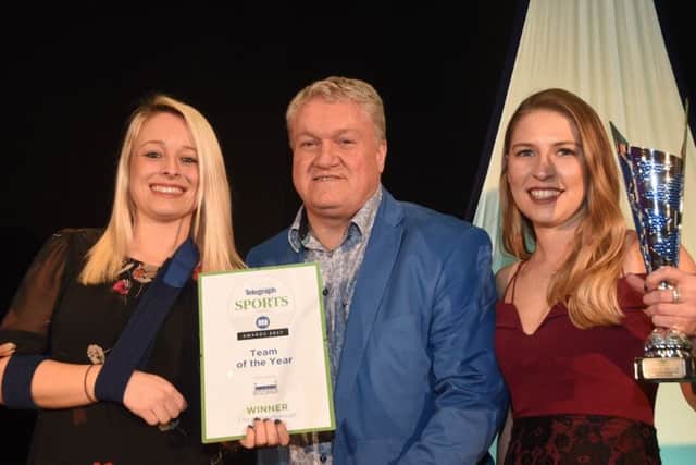 City of Peterborough Hockey Club Ladies first XI skipper Robyn Gribble (right) and vice-captain Emma Faux (left) collected the team of the year prize from sponsor Stephen 'Tommy' Cooper of Sports Ground Development.