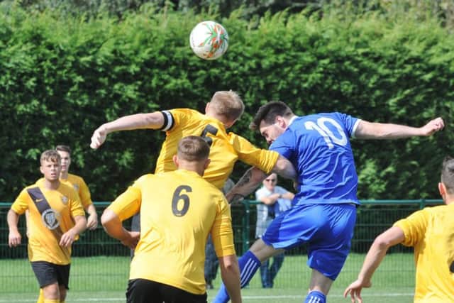 Tom Waumsley (10) scored for Yaxley at Wellingborough Whitworth.