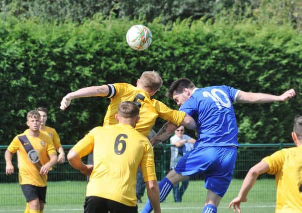 Tom Waumsley (10) scored for Yaxley at Wellingborough Whitworth.