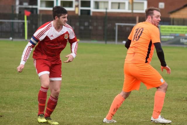 Lee Clarke (right) scored twice for Blackstones against Lutterworth Athletic.