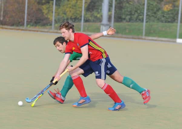 Danny Sisson (red) scored a hat-trick in both weekend games for City of Peterborough.