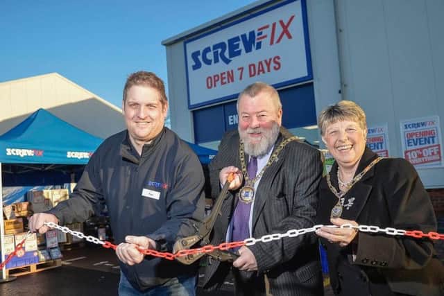 Official opening, from left, Paul Cooper, store manager, Mayor of Peterborough Cllr John Fox and Mayoress of Peterborough Cllr Judy Fox.