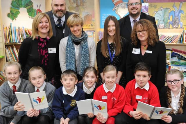 Claire Spooner, Rachel Woodford, Fran Hollingsworth, Rachel Simmons with Ben Wilding and Ryhs Thrower with pupils from Gunthorpe, Wittering, John Clare and Werrington primary schools who have now  formed the Soke Educational Trust EMN-180502-133802009