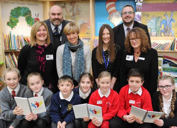 Claire Spooner, Rachel Woodford, Fran Hollingsworth, Rachel Simmons with Ben Wilding and Ryhs Thrower with pupils from Gunthorpe, Wittering, John Clare and Werrington primary schools who have now  formed the Soke Educational Trust EMN-180502-133802009