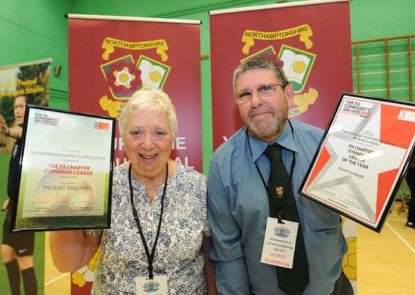 Hazel Burgess pictured receiving county and regional FA Chartered Standard League awards  last year on behalf of the Junior Alliance League.