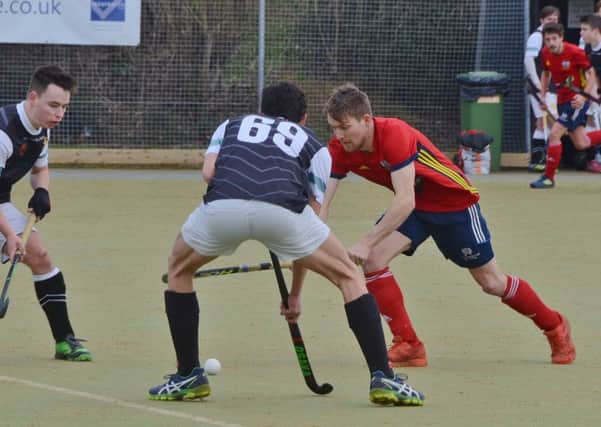 Hockey action from last weekend's game between City of Peterborough and Cambridge University. Photo: David Lowndes.
