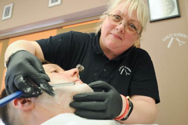 Lisa Aldridge, senior hairdresser and barber at Loxley , Werrington. EMN-180702-154354009