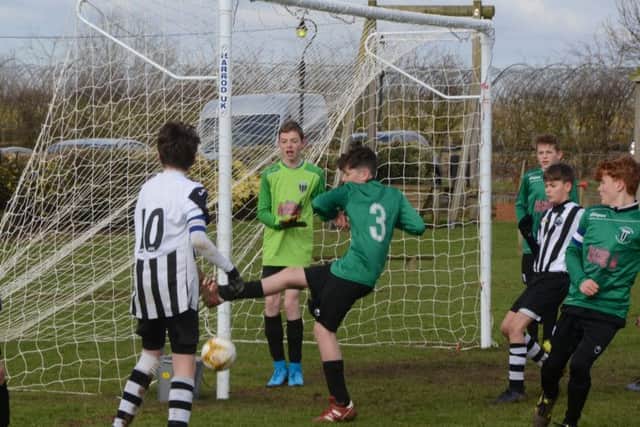 Action from the game between Oundle Town U14s and Blackstones.