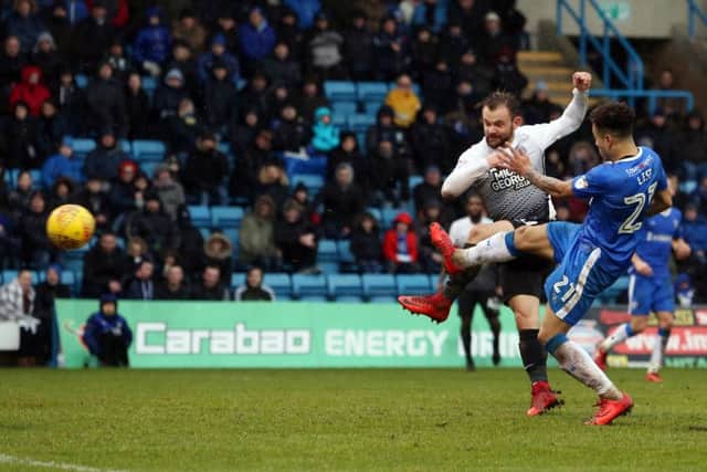 Danny Lloyd shoots Posh ahead at Gillingham. Photo; Joe Dent/theposh.com.