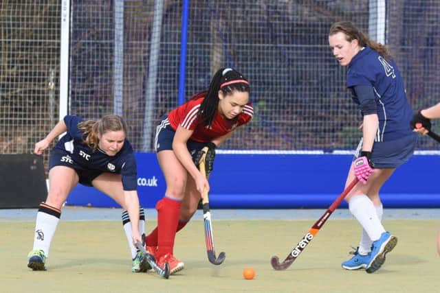 Tierney Augustine (red) scored the only goal for City of Peterborough Ladies against Wapping.
