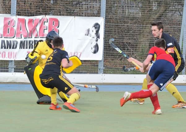 City of Peterborough (red) missed thbis chance early in the game against Beeston. Photo: David Lowndes.