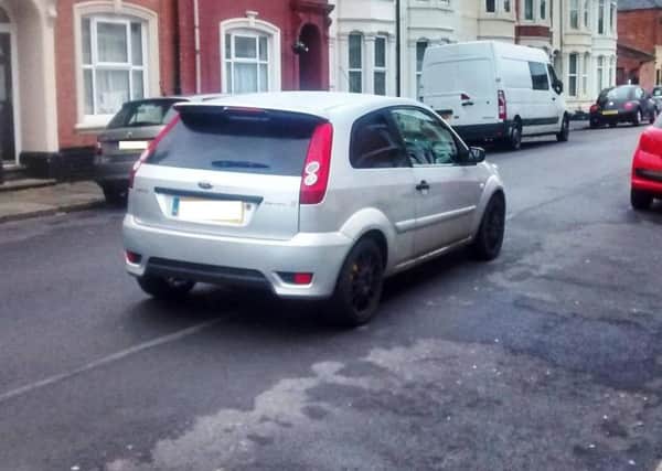 Cars parked away from the kerb face being fined