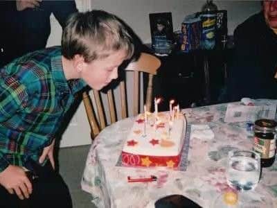 A young Andrew celebrating his birthday