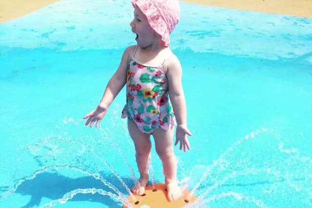 Two-year-old Everleigh enjoying the water park
