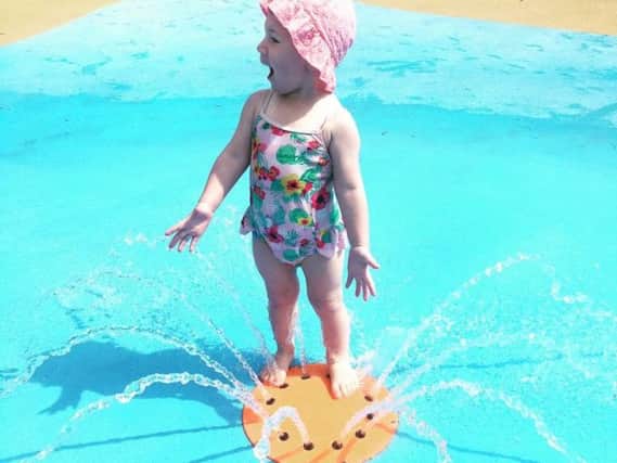 Two-year-old Everleigh enjoying the water park