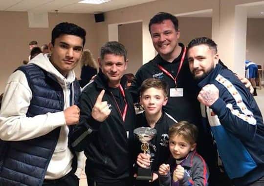 Pictured at the Northampton show are from the left, back, Imran Aref, coach Paul Goode, coach Leighton Morgan, dad Jack Gowler, front, Shea Gowler and Blue Gowler.