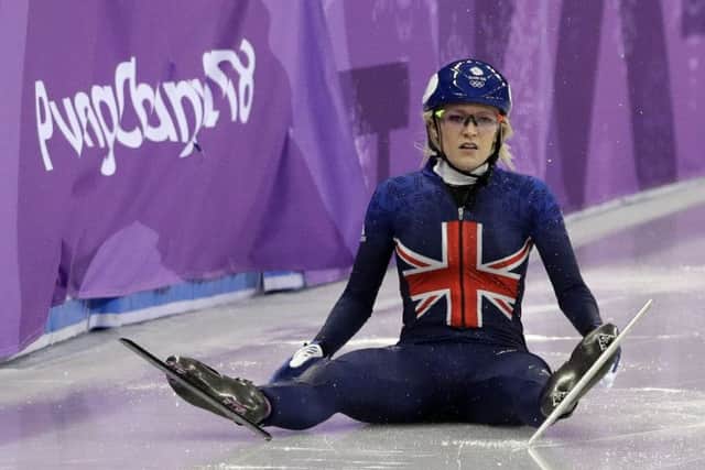 Great Britain speed skating hope Elise Christie after falling over the Winter Olympic 500m final.
