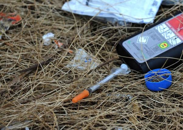 Discarded drugs needles on wasteland behind Century Square ENGEMN00120111006182656