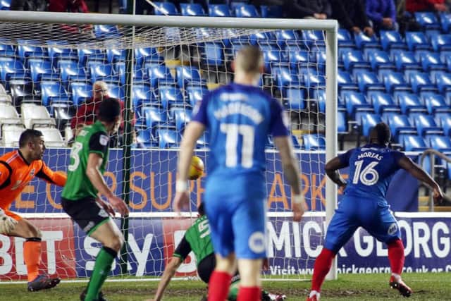 Junior Morias tucks home the second Posh goal against Scunthorpe. Photo: Joe Dent/theposh.com.