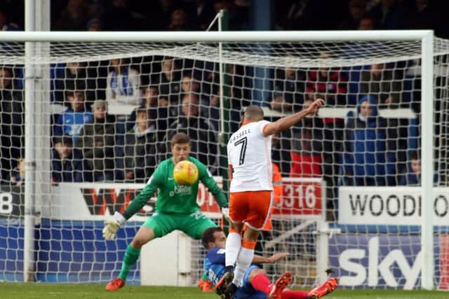 Former Posh striker Kyle Vassell scores the only goal of the game for Blackpool at the ABAX Stadium in November.
