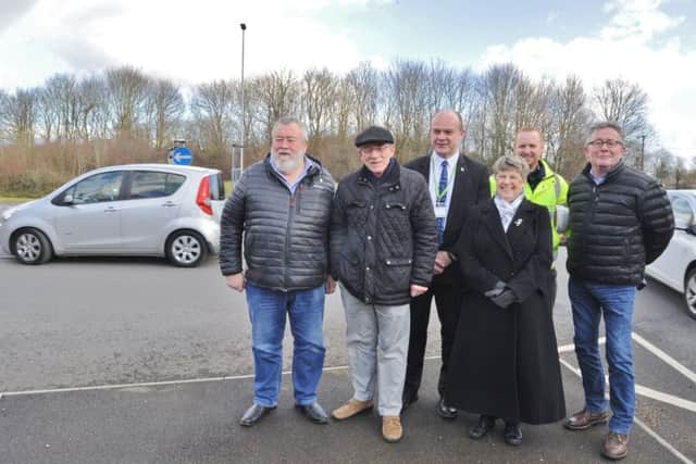 Mayor of Peterborough Coun. John Fox, Mayoress Judy Fox, Coun. Peter Hiller, Coun Stephen Lane with Andy Tatt and and Scott Blackburn from Skanska at the Werrington Centre roundabout which is now improved and safer that the previous junction. EMN-180215-152018009