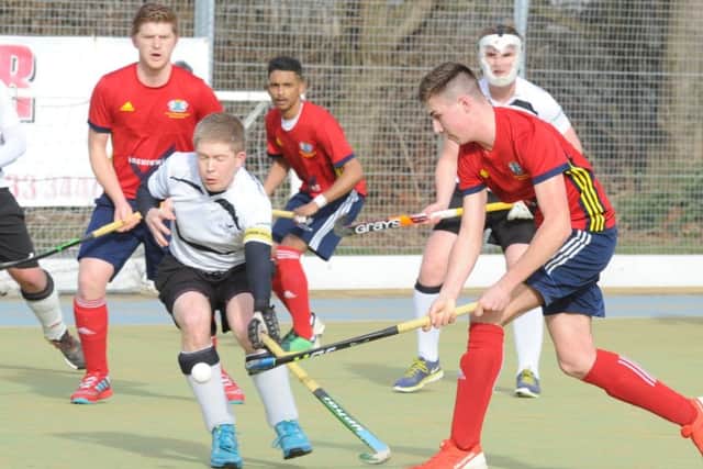 City of Peterborough's Brendan Andrews (red) juggles the ball during a 4-3 win over Harleston at Bretton Gate. Photo: David Lowndes.