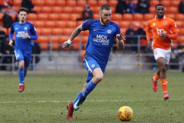 Marcus Maddison in action for Posh at Blackpool.  Photo: Joe Dent/theposh.com.