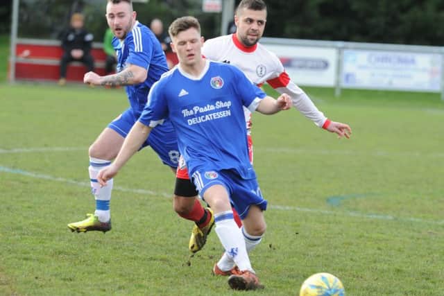 Lewis McManus in action for ICA Sports against Peterborough Polonia. Photo: David Lowndes.