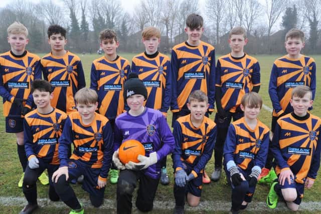 Glinton & Northborough Amber Under 13s are pictured before their 3-2 win over Riverside Rovers. From the left are, back, Logan Noble, Mekhi Underwood, Louie Diemh, Archie East, Nathan Whitfield, Harvey Robertson, Eden Spooner, front,  Samme Oliviero, Finlay Hopkins, Freddie Butcher, Jamie Nixon, Stephen Bliss and Luke ODonnell.