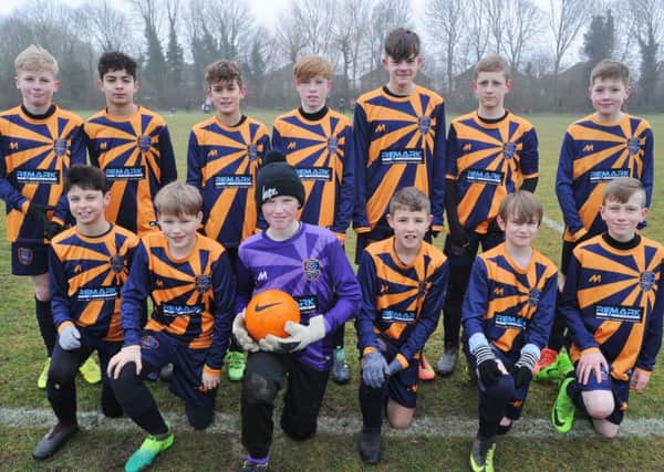 Glinton & Northborough Amber Under 13s are pictured before their 3-2 win over Riverside Rovers. From the left are, back, Logan Noble, Mekhi Underwood, Louie Diemh, Archie East, Nathan Whitfield, Harvey Robertson, Eden Spooner, front,  Samme Oliviero, Finlay Hopkins, Freddie Butcher, Jamie Nixon, Stephen Bliss and Luke ODonnell.
