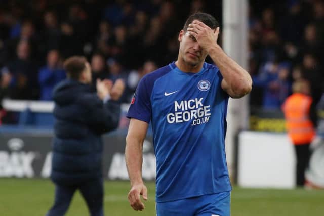Steven Taylor missed a League One match for Posh for the first time at Blackpool.