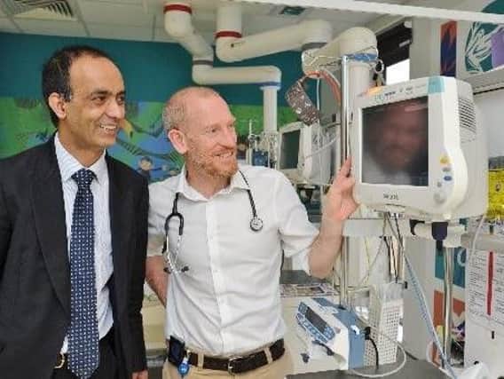 Mohammed Farooq and Dr Tim Jones at Peterborough City Hospital