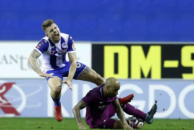 Manchester City's Fabian Delph's horror tackle on Wigan's Max Power.