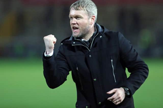 Will Posh manager Grant McCann be celebrating in May?