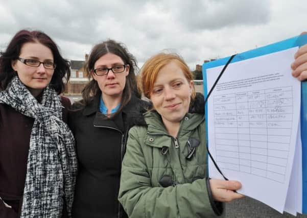 Bernadette Gibbons, Fiona Henry and Kirsty Hadfield with their petition against needles being found around the city. EMN-180221-155126009
