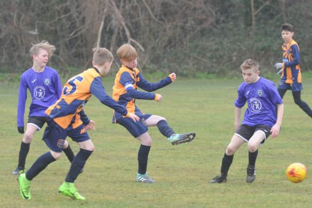 Action from Glinton and Northborough Amber Under 13s v Riverside Rovers Under 13s.