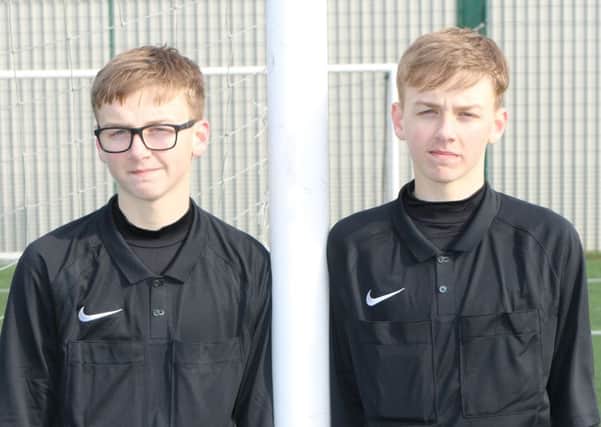 Refereeing twins  Ashley (left) and Oliver Hammond.