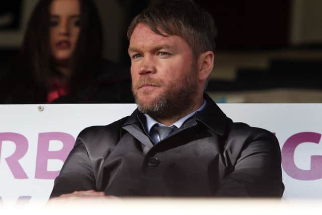 Posh boss Grant McCann before yesterday's game against AFC Wimbledon.