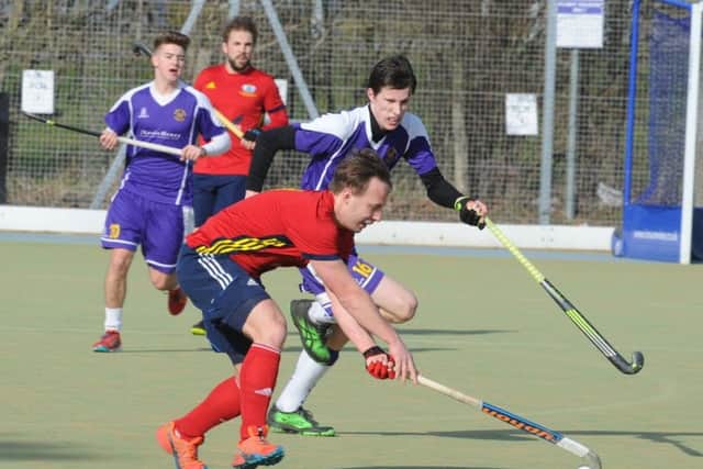 Action from City of Peterborough's 4-0 win over Saffron Walden. City are in red. Photo: David Lowndes.