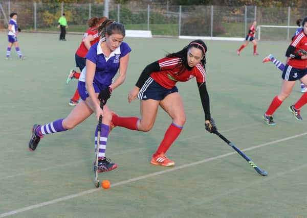 Tierney Augustine (red) scored for City of Peterborough at West Herts.