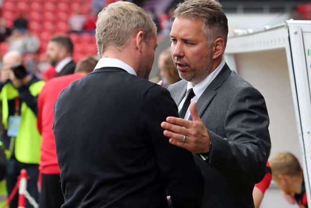 The most successful Posh manager of all-time Darren Ferguson with Grant McCann earlier this season.