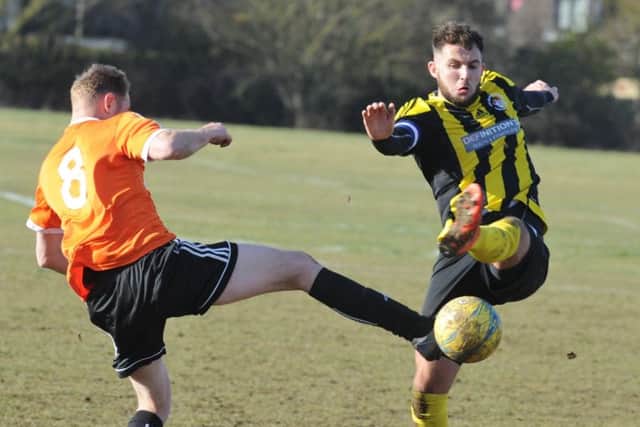 Action from Thorney's President's Shield semi-final win against Holbeach United Reserves. Photo: David Lowndes.