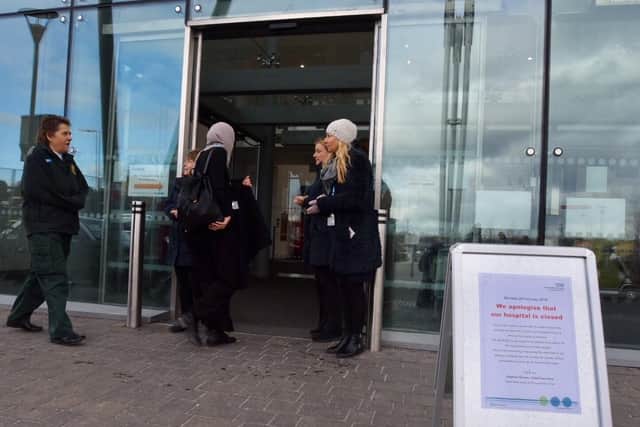 A sign detailing Peterborough City Hospital's closure outside the main entrance this morning