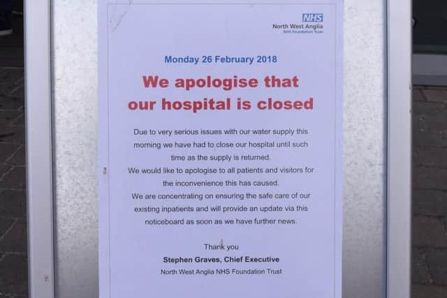 A sign detailing Peterborough City Hospital's closure outside the main entrance this morning