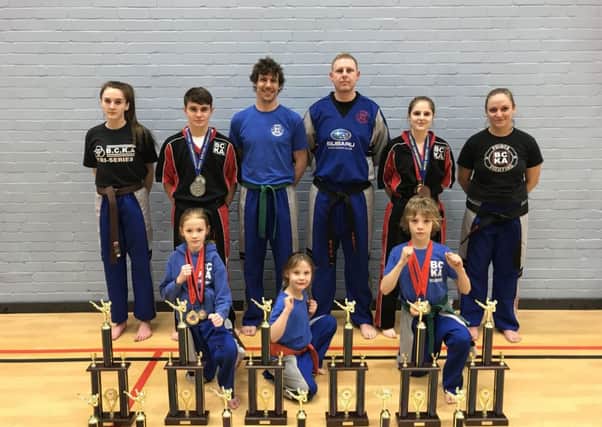 Peterborough BCKA trophy winners. From the left are, back,  Abi Daulton, Eddy Paddock, Mike Dunk, Colin Lock, Jaden Harris, Kim Smith, front, Hannah Cameron, Lexi Dunk and Jay Dunk.