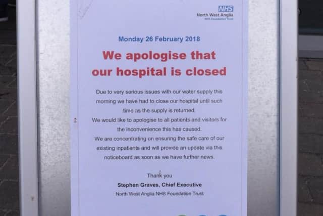 A sign detailing Peterborough City Hospital's closure outside the main entrance this morning