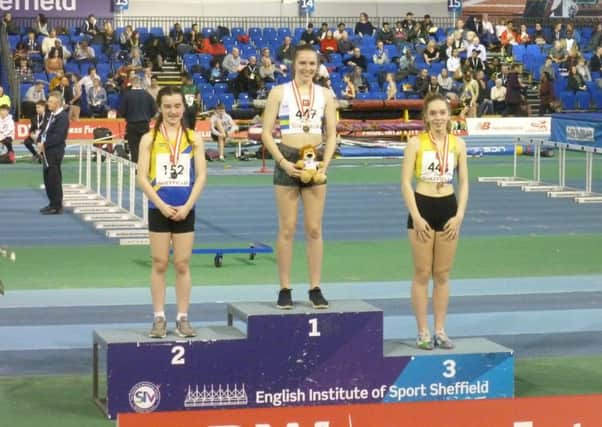 National champion Elizabeth Taylor on top of the podium in Sheffield.