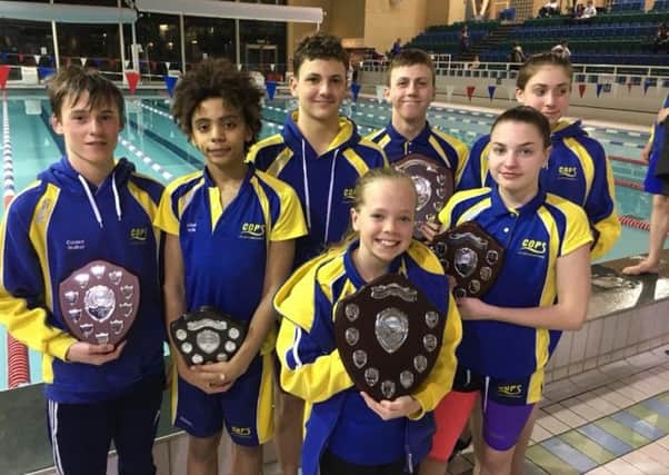 COPS top boys and top girls at the Cambs County Championships. From the left they are Connor Walker, Josh Martin, Henry Pearce, Matt Newson, Ella McGhie, Ruby Blakeley and Eve Wright.
